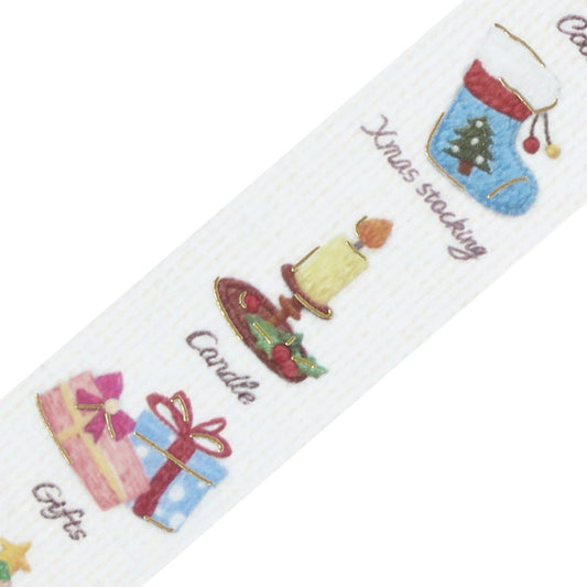 Close-up of BGM Pieni Stitch washi tape: Gifts, Candle and Xmas stocking motifs with gold-foil outlines on a linen texture