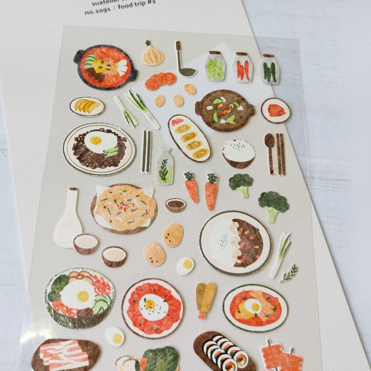 Suatelier Sticker — Food Trip #2 — applied in a journal