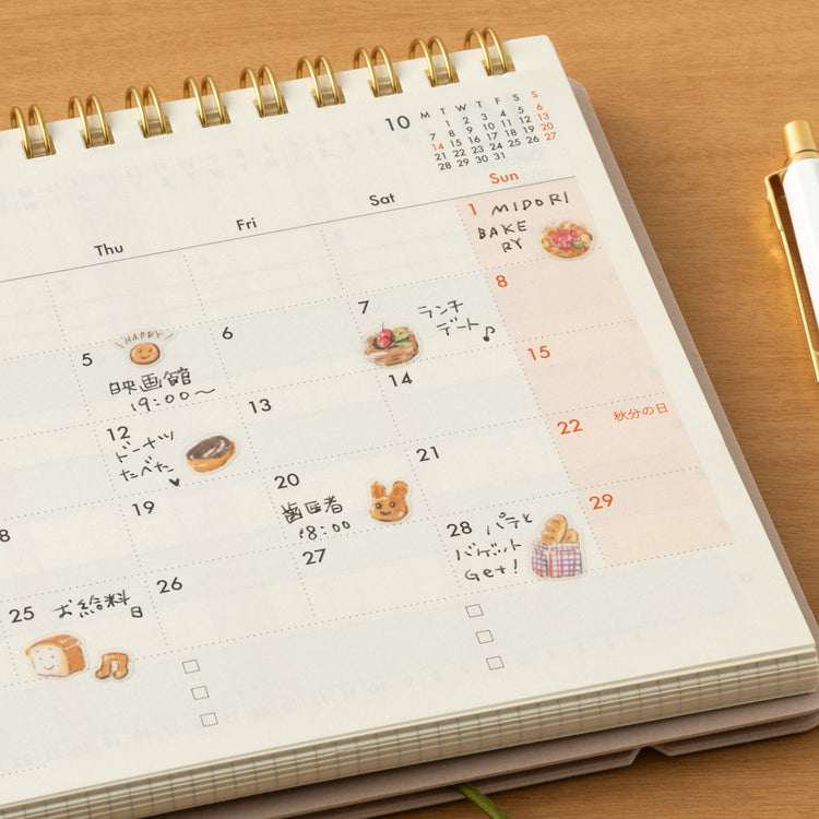 Midori Sticker <1 Sheet> — Bread — applied in a journal