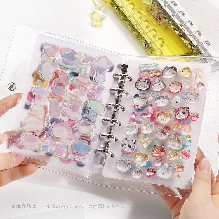 BGM Notebook-Style Sticker Book — A6 Glitter Clear — applied in a journal