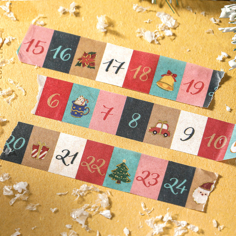 Three torn strips of BGM Advent Calendar washi tape on kraft paper, showing days 6 to 24 in colour blocks