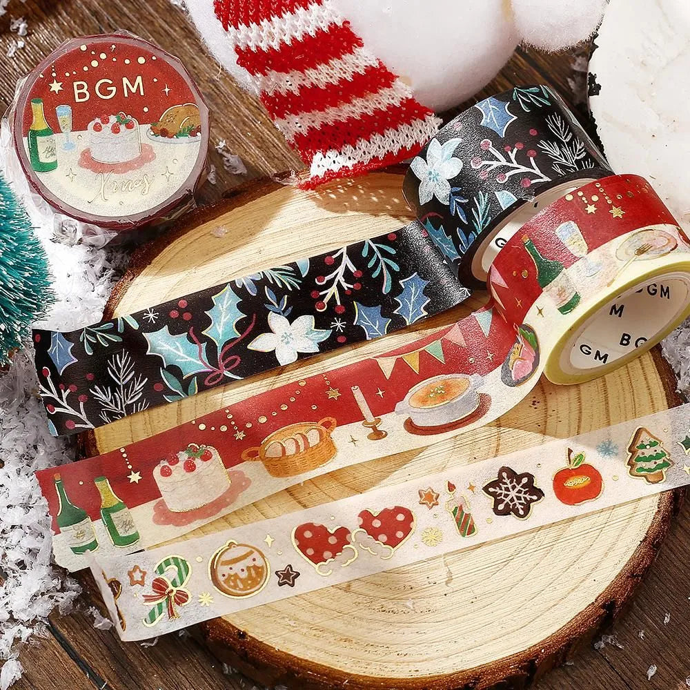 BGM Christmas washi tape featuring holly, berries, and winter flowers with gold foil details.