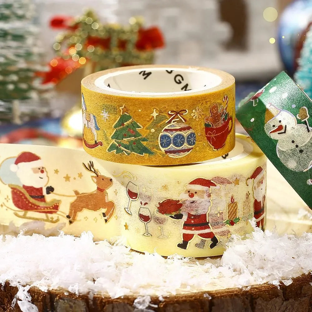 BGM Santa’s Coming Christmas washi tape featuring Santa carrying gifts with gold foil accents.