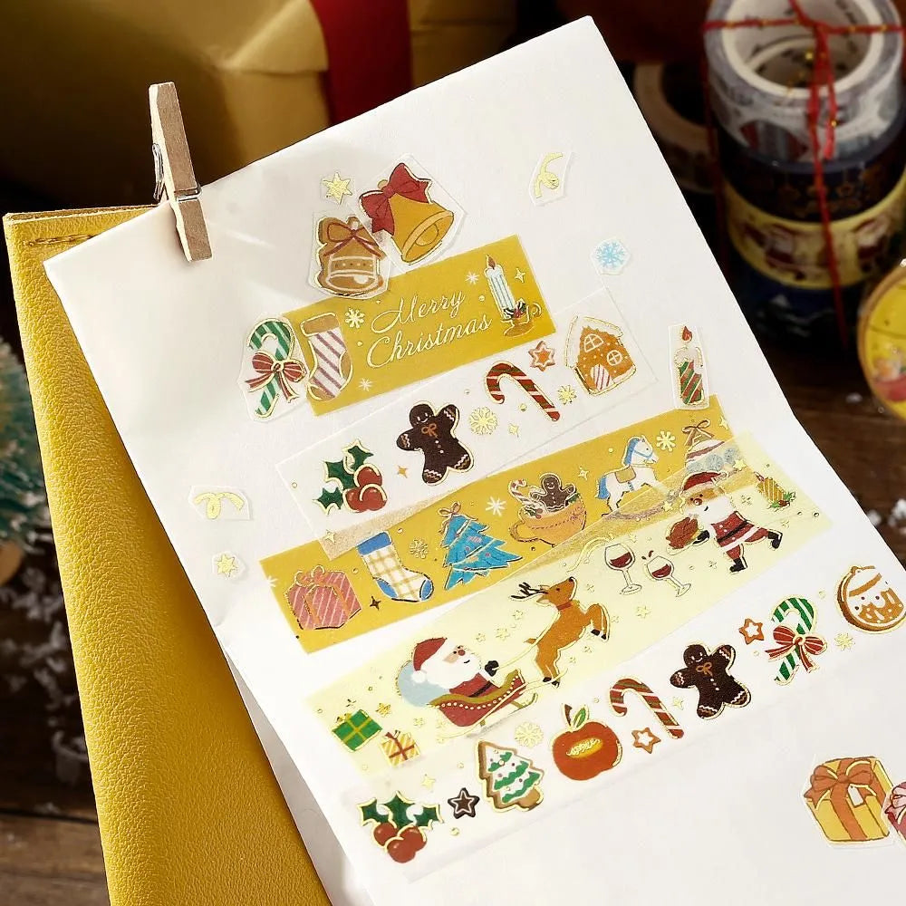 BGM Santa’s Coming Christmas washi tape featuring Santa carrying gifts with gold foil accents.