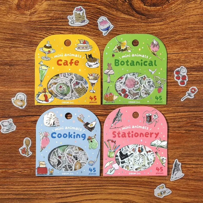 BGM Foil Stamping Flake Seal – Mini Mini Animals series includes 45 washi stickers with foil accents per set, showcasing cute animal illustrations across four delightful themes: Café, Botanical, Cooking, and Stationery. Each sticker is crafted from textured washi paper and finished with refined foil stamping.