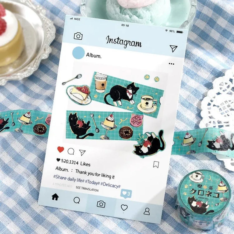 BGM Foil Stamping Masking Tape – Black Cat Café: Café Stroll 20mm washi tape roll featuring black cats with desserts, coffee, and foil paw prints.