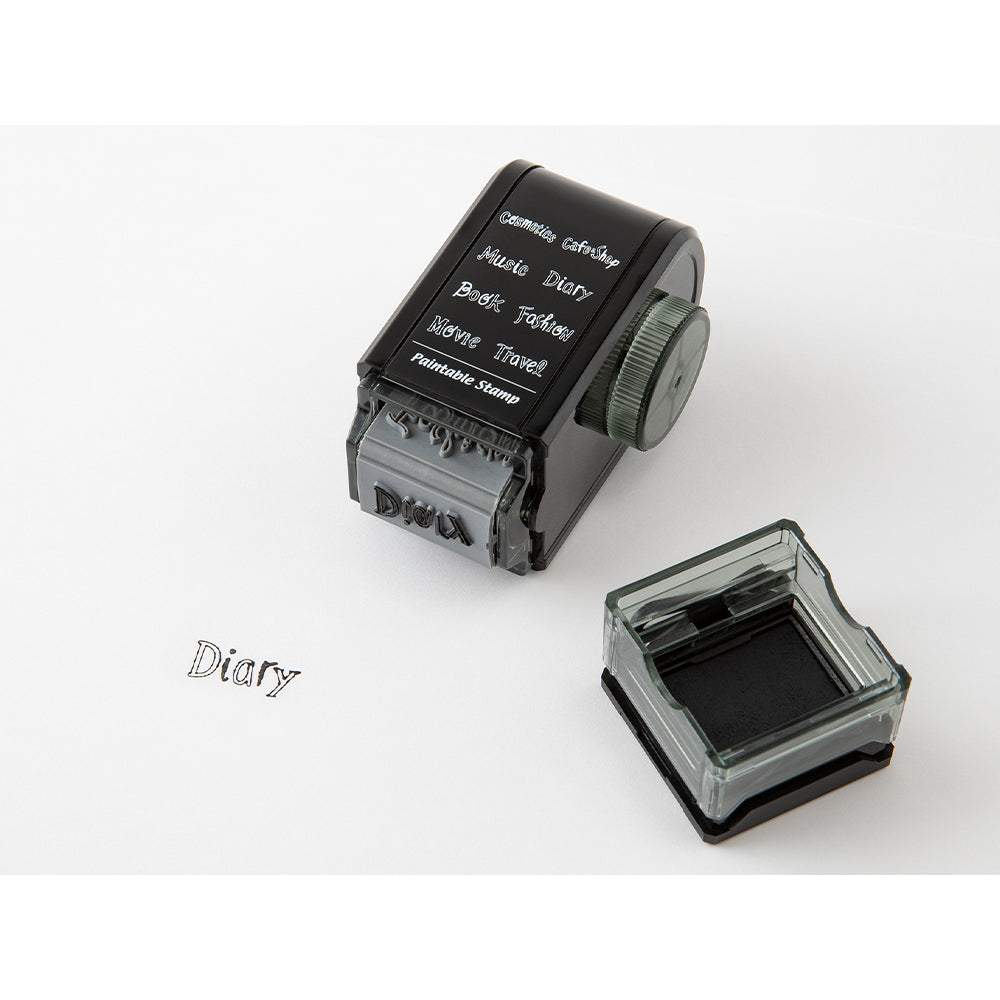Midori Paintable Rotating Stamp Dial — Title — close-up of design