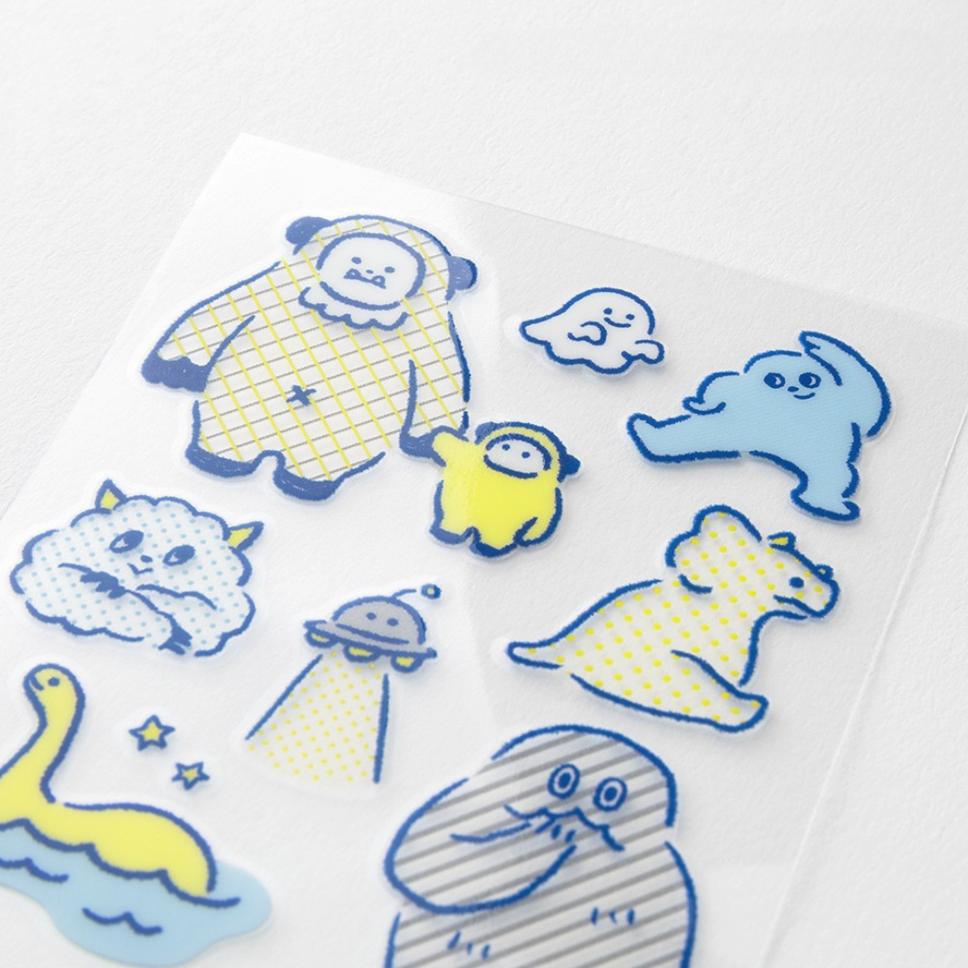 Midori Glossy Transfer Sticker — Monster — applied in a journal