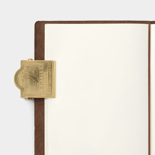 Traveler's Notebook Refill 030 (Regular Size) — Brass Clip Airplane — in use on paper