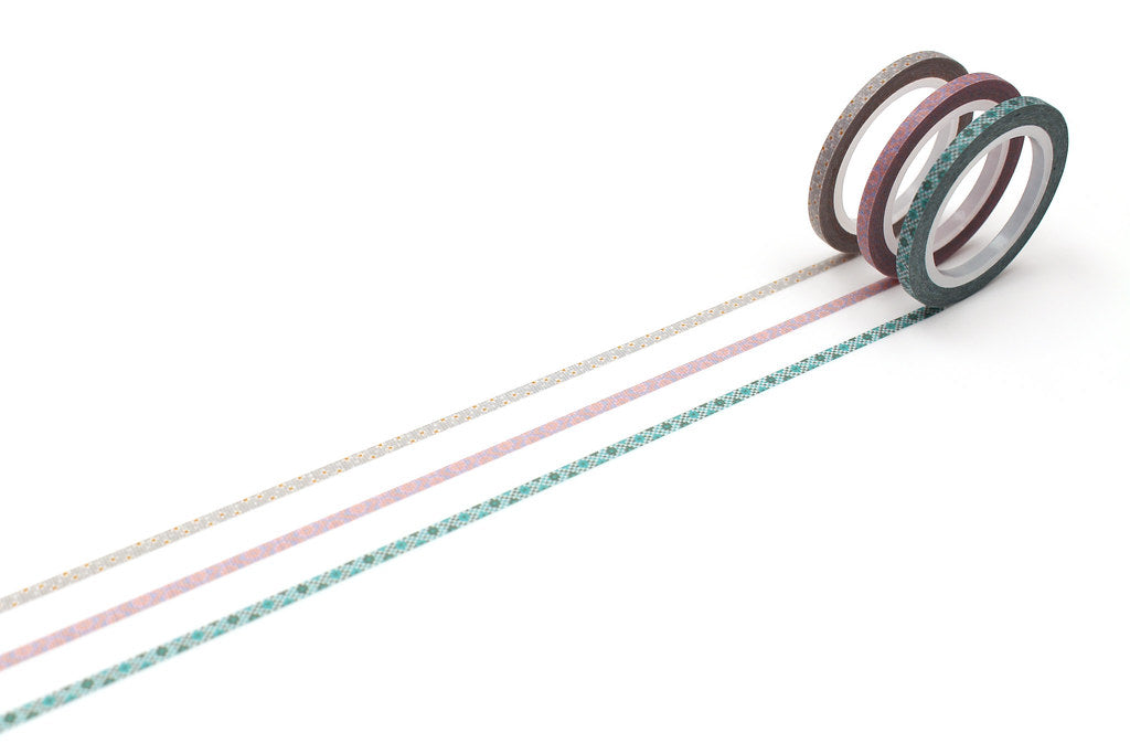 mt Slim Washi Tape — Cross Stitch — rolled out on paper