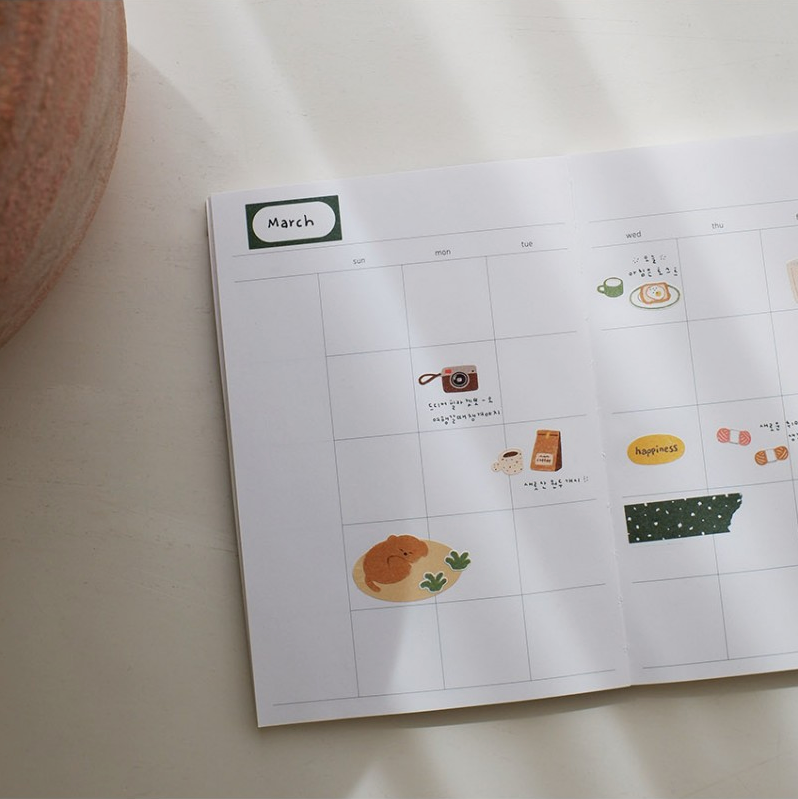 Suatelier Sticker — Small Happiness — applied in a journal