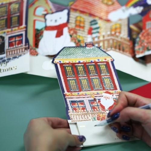 D'Won 3D Pop Up Christmas Card — Santa Town — card open showing design
