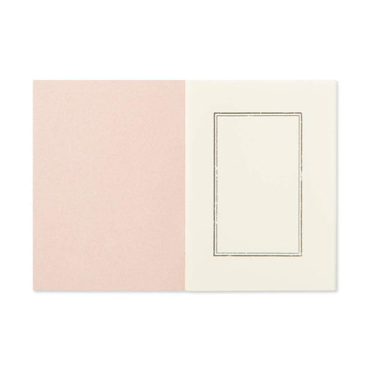 Traveler's Notebook Refill (Passport Size) — Sticker Release Paper — in use