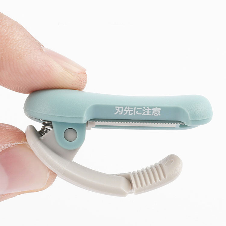 Kokuyo Me Clip-Type Tape Cutter (10-15mm) — Golden Green — side view